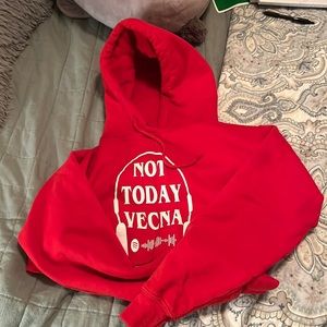 It is a Stranger Things hoodie with a Spotify code on it